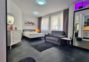 APOLONIALiving Karlsruhe - Designer Studio-Appartement mit Farbakzenten im Zentrum